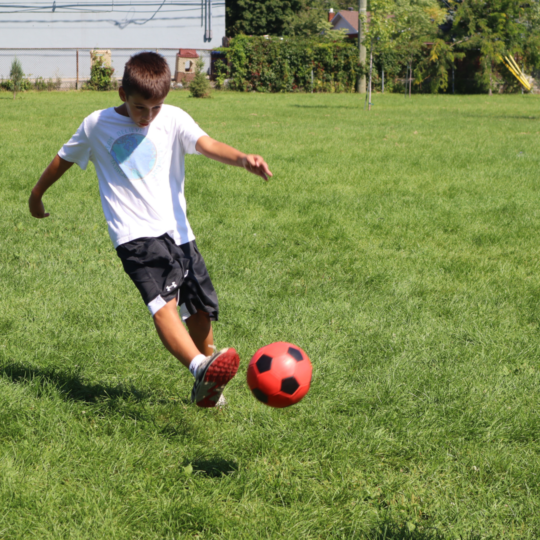 Playing soccer outdoors